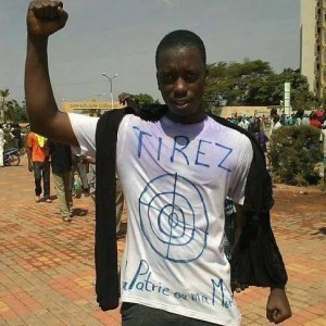 Protester with a target drawn onto his t-shirt