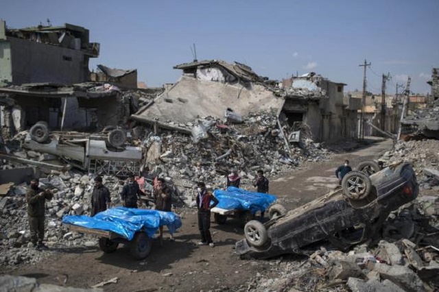 Aftermath of a US airstrike in Mosul, Iraq which led to the death of 230 civilians. (Source: The Guardian)
